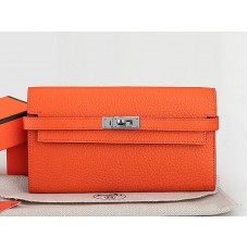 Cartera larga Kelly de piel original Dogon Togo de Hermes, color naranja