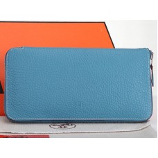 Cartera Hermes con cremallera de piel original azul claro