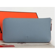 Cartera Hermes con cremallera de piel original azul claro