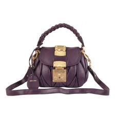 Bolso pequeño cofre morado de Miu Miu