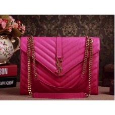 Bolso satchel grande clásico con monograma de Yves Saint Laurent en piel matelassé texturizada con efecto lápiz labial color fucsia.