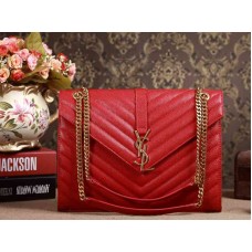 Bolso satchel grande clásico con monograma de Yves Saint Laurent en piel matelasse texturizada Grain de Poudre color rojo lápiz labial