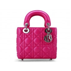Bolso Dior Nano de piel con herrajes plateados y rosa intenso