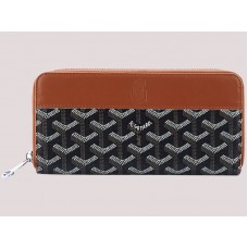Cartera Goyard Goyardine Matignon negra con ribete de piel marrón