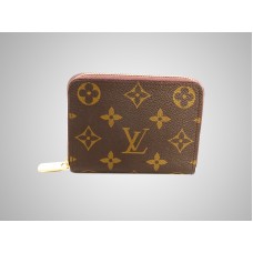 Monedero con cremallera y monograma de Louis Vuitton