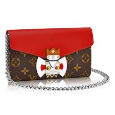 Cartera con cadena y diseño de máscara tribal con monograma de Louis Vuitton, color rojo