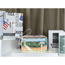 Cartera Louis Vuitton Volga Iridescent Prism de PVC con monograma en relieve m44458